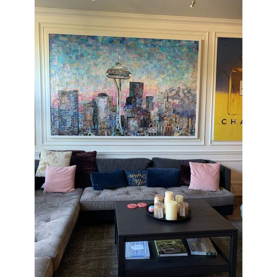 The Seattle Skyline collage hanging above a sofa
