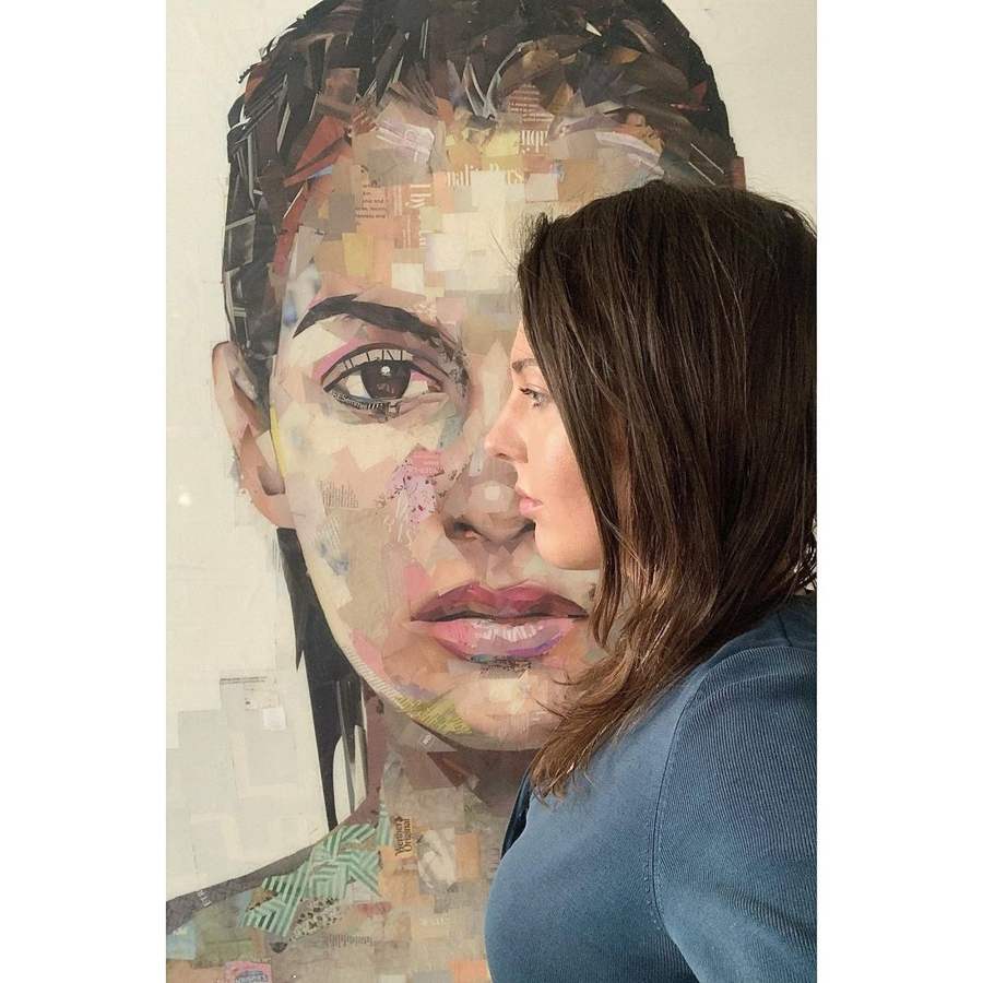 Mosaic collage artist Whitney L Anderson beside one of her collage portraits